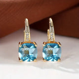 Златни обеци с мистериозни камъни