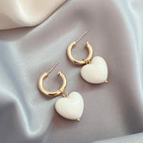 Сърцевидни обеци в бяло злато