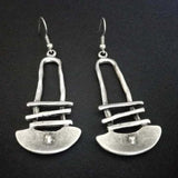 Геометрични обеци с специална форма