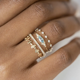 Четиригранен пръстен от цирконий с четири диаманта