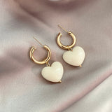 Сърцевидни обеци в бяло злато