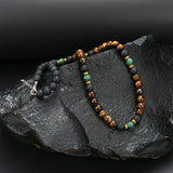 Разкошно колие с мъниста от тигрово око и златиста закопчалка