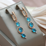 Елегантни обеци с сини кристали в злато