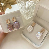 Елегантни обеци от злато с барокови перли